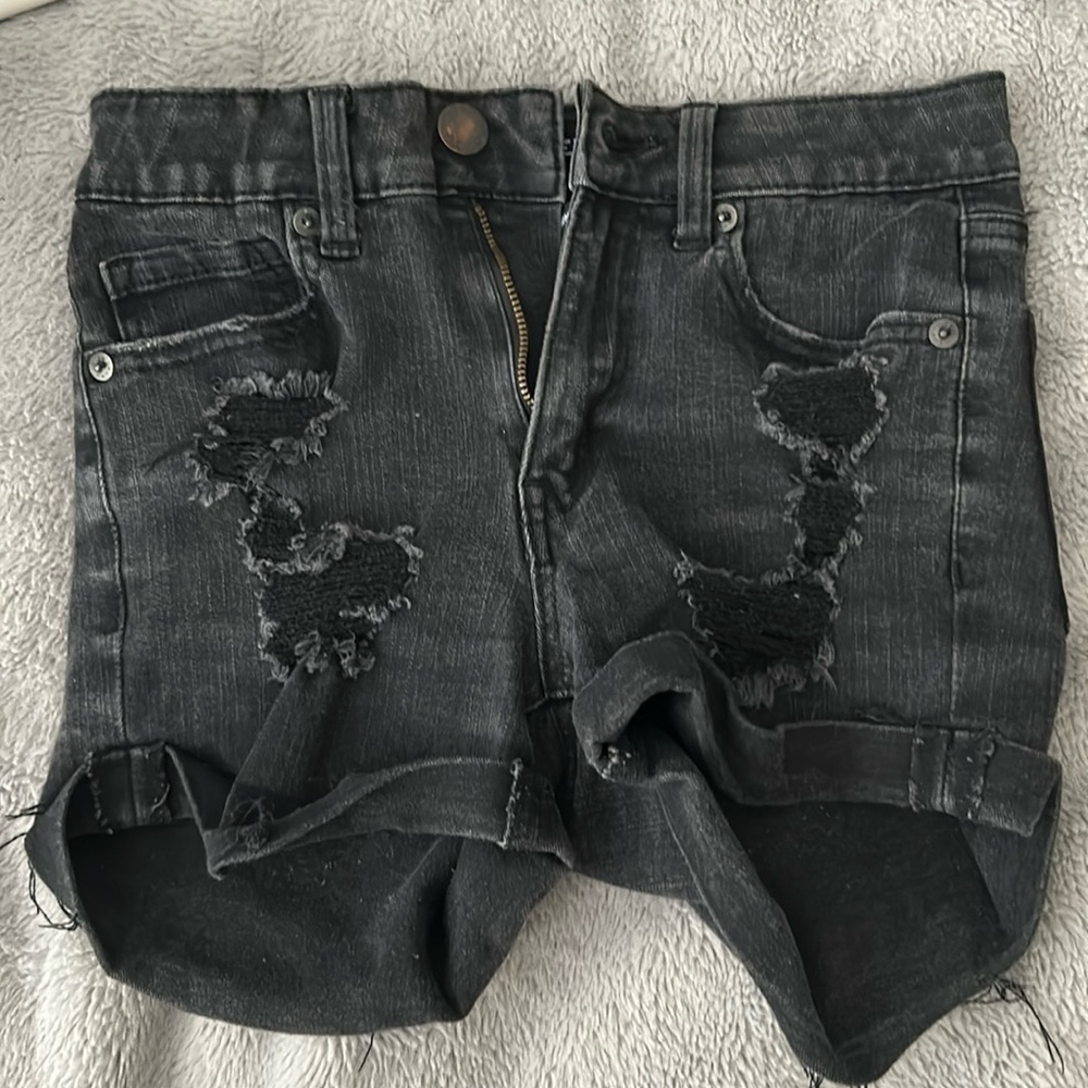 Women High rise black ripped shorts